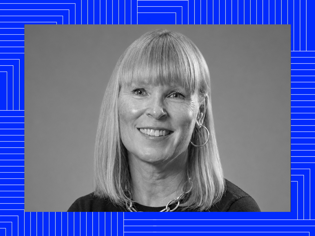 Black-and-white portrait of Kate over a blue patterned frame